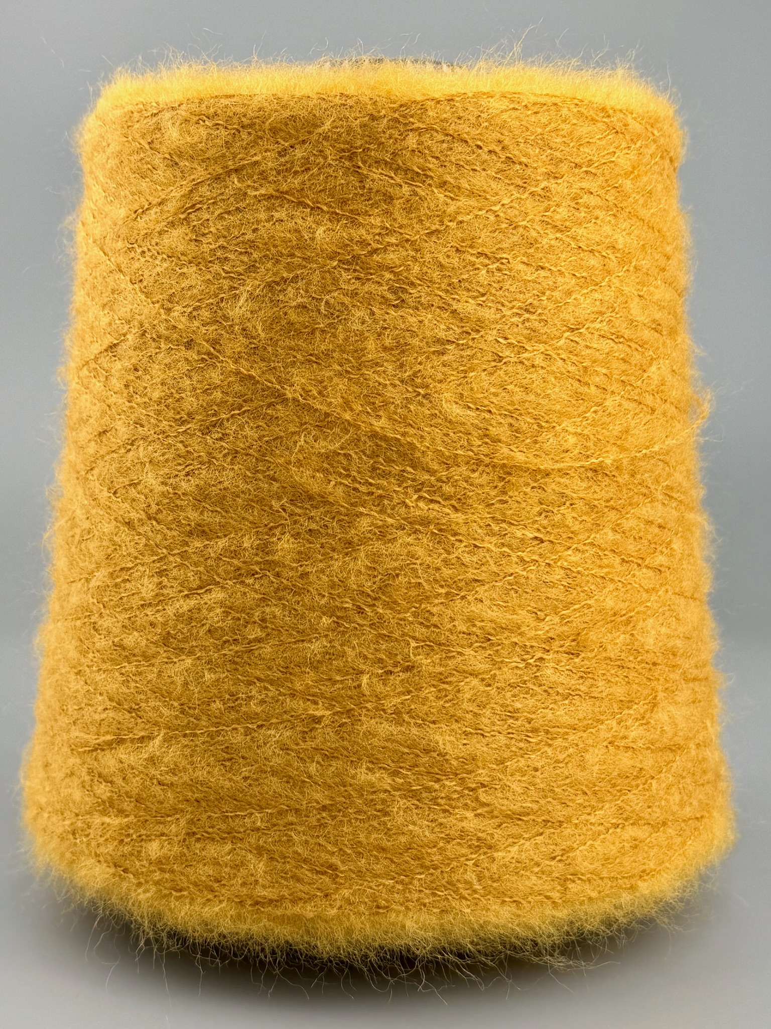 Kid Mohair mit Nylon 900 m / 100 g – Outlet – Senfgelb foto 2